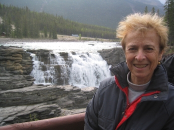 Ann Barbara before a Yellowstone waterfall.Patience, this 347&times;260 image (72 KB) may take a while to load.